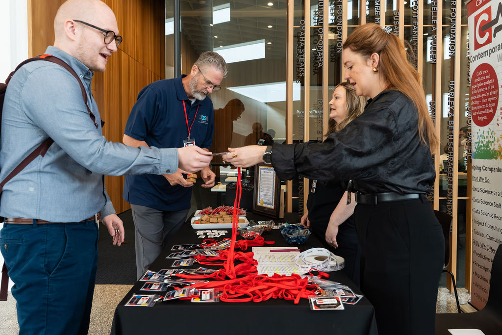 Attendee picking up a badge at check-in