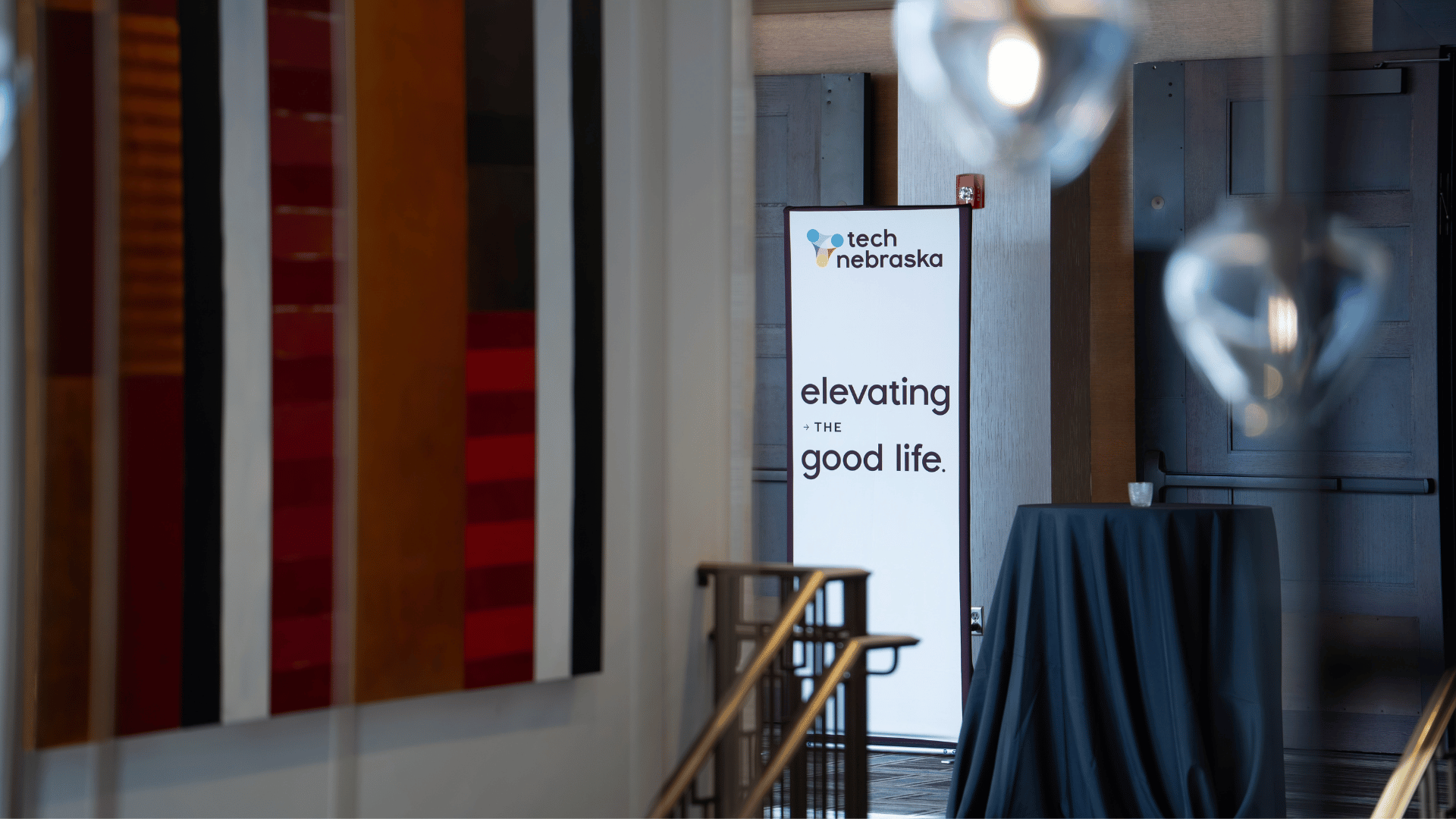 Tech Nebraska elevating the good life banner at the venue
