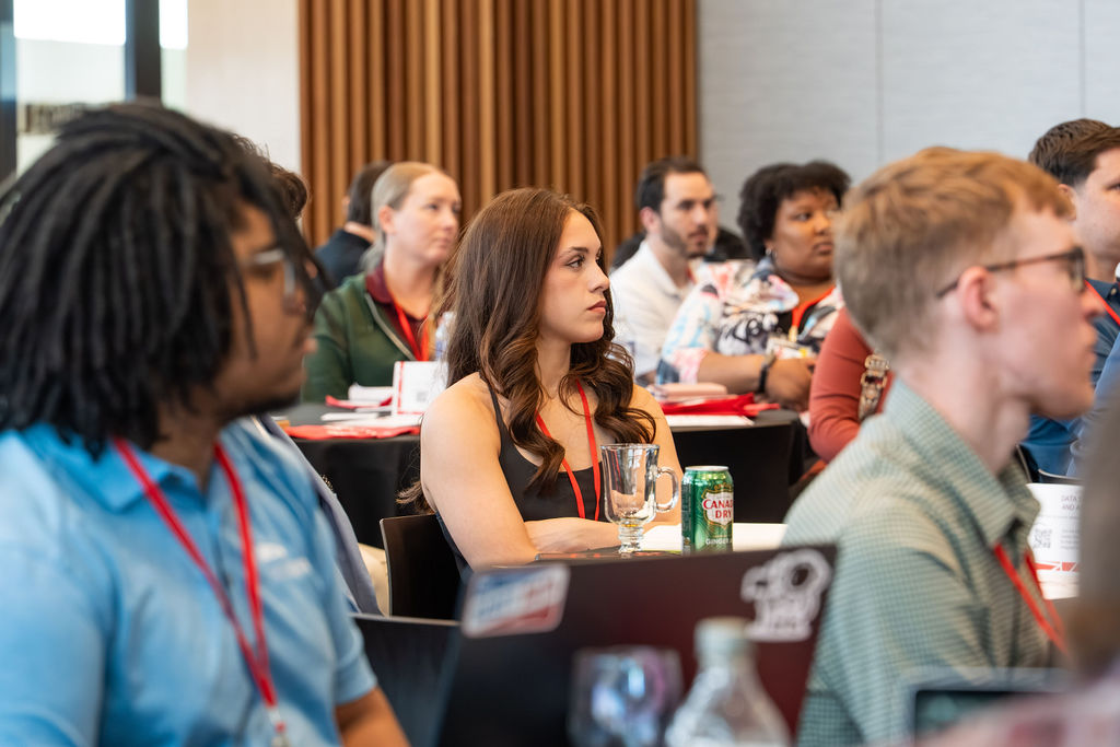 Attendees focused on a session