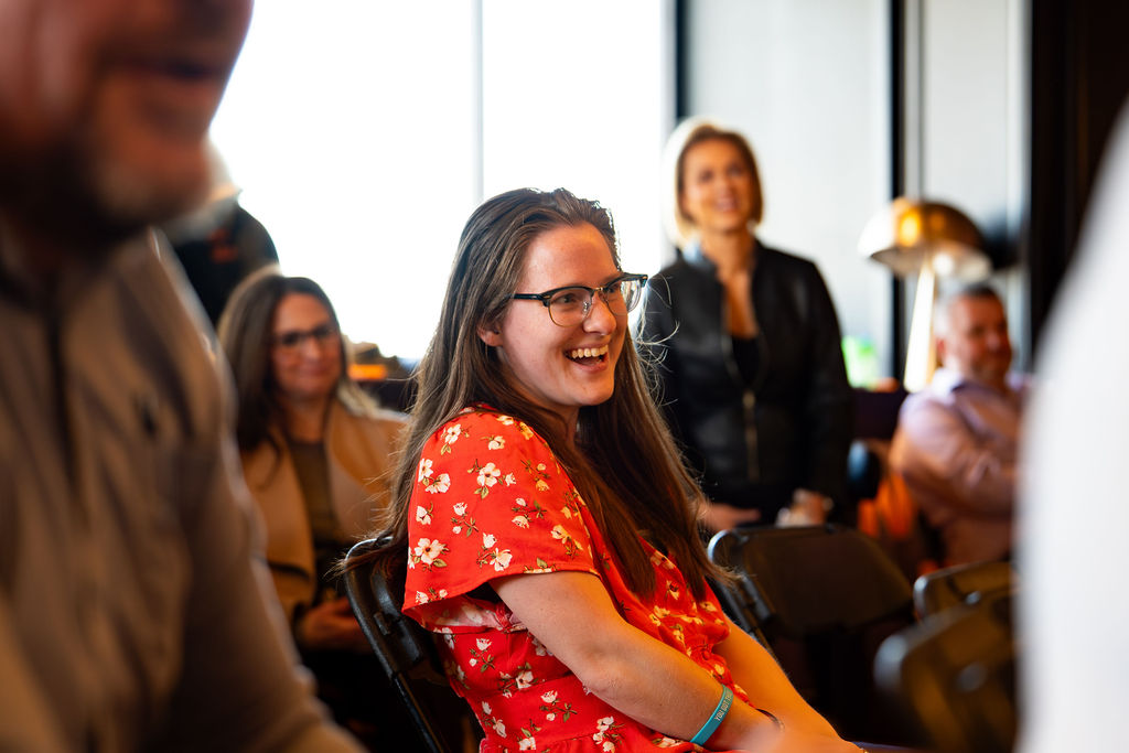 Attendee laughing during a session